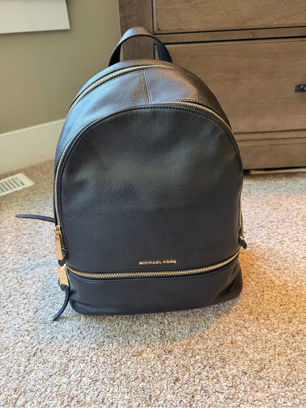 Michael Kors Black Leather Backpack with Gold Accents